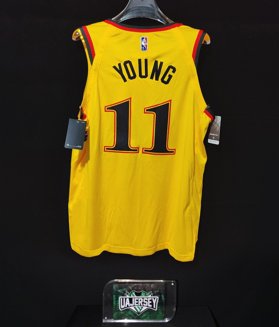 trae young yellow jersey